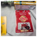 Lot of Die Cast Tractors in Packages as shown
