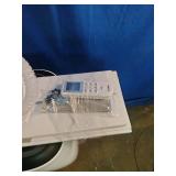 Airo Comfort portable air conditioner featuring a white finish and an included window vent kit