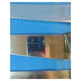 This is a vintage lot of assorted stainless steel kitchen knives