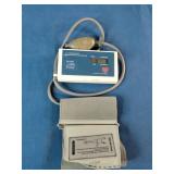 Lumiscope Digitronic 1085M or similar semi-automatic digital blood pressure monitor.