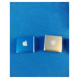 (3) Apple iPod Shuffle 4th Generation devices, known for their ultra-compact design and built-in clip.