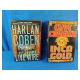 Inca Gold by Clive Cussler and Live Wire by Harlan Coben, both popular suspense thrillers.