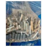 518 pieces of mixed, nickel-plated .357 Magnum shell casings intended for ammunition reloading.