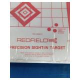 A collection of shooting range accessories designed for firearm target practice and optic zeroing.