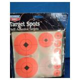 A collection of shooting range accessories designed for firearm target practice and optic zeroing.
