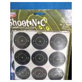 A collection of shooting range accessories designed for firearm target practice and optic zeroing.