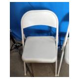 Metal folding chairs featuring a tubular metal frame