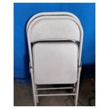 Metal folding chairs featuring a tubular metal frame