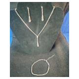 Brand new adjustable length necklace, bracelet, and earrings set