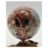 Polished Mexican Crazy Lace Stone Sphere on Driftwood Stand