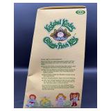 Cabbage Patch Kid - Arxon - German - Pigtail - Lemon Hair - Blue Eyes - Dimples and Pacifier - Girl - MIB