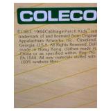 Cabbage Patch Kid - Coleco - Hong Kong - 1985 - Loop - Lemon Hair - Blue Eyes - Girl - Dimples & Pacifier - MIB