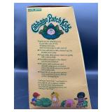 Cabbage Patch Kid - Coleco - Hong Kong - 1985 - Loop - Lemon Hair - Blue Eyes - Girl - Dimples & Pacifier - MIB