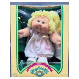 Cabbage Patch Kids - Coleco - 1985 - Ponytail - Lemon Hair - Green Eyes - Girl - Dimple & Glasses (broken) - MIB