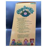 Cabbage Patch Kids - Coleco - 1985 - Ponytail - Lemon Hair - Green Eyes - Girl - Dimple & Glasses (broken) - MIB