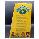 Cabbage Patch Kid - Coleco - 1985 - Yellow Blonde - Ponytail - Green Eyes - Girl - Dimples & Tooth - MIB