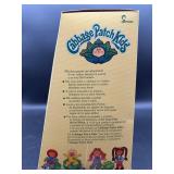 Cabbage Patch Kid - Jesmar - Loop - Shag - Tan Hair - Green Eyes - Girl - Dimples & Pacifier - MIB