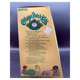 Cabbage Patch Kid - Coleco - Braided Ponytail - Tan Hair - Green Eyes - Dimples & Pacifier - MIB