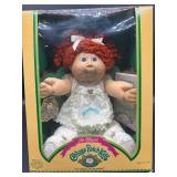 Cabbage Patch Kid - Coleco - Popcorn - Orange - Blue Eyes - Girl - Dimples & Tongue - MIB