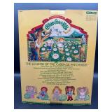 Cabbage Patch Kid - Coleco - Popcorn - Orange - Blue Eyes - Girl - Dimples & Tongue - MIB