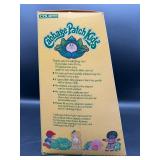 Cabbage Patch Kid - Coleco - Popcorn - Orange - Blue Eyes - Girl - Dimples & Tongue - MIB