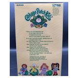 Cabbage Patch Kid - Tsukuda - Coleco - 1985 - African American - Double Ponytail - Brown Hair - Brown Eyes - Girl - Dimples & Pacifier - MIB
