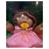 Cabbage Patch Kid - Tsukuda - Coleco - 1985 - African American - Ponytail - Brown Hair - Brown Eyes - Girl - Dimples & Pacifier - MIB