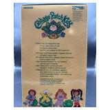 Cabbage Patch Kid - Tsukuda - Coleco - 1985 - African American - Ponytail - Brown Hair - Brown Eyes - Girl - Dimples & Pacifier - MIB