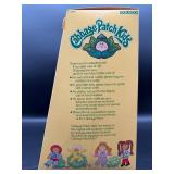 Cabbage Patch Kids - Coleco - Bald - Blue Eyes - Boy - Dimples & Teeth - Hand Holds - MIB