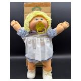 Cabbage Patch Kid - Coleco - Braided Ponytail - Lemon Hair - Green Eyes - Girl - Dimples & Pacifier - with Box