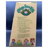Cabbage Patch Kid - Coleco - 1985 - Loop with Double Ponytail - Blue Eyes - Girl - Dimples & Pacifier - MIB