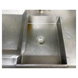Left side stainless steel drain board; right-side sink