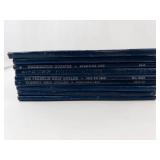 9 empty Whitman folders