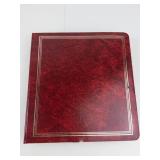2) 3 ring binders of 12 pocket vinyl pages (empty)