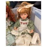 Three Porcelain Dolls - One with Swing