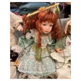 Three Porcelain Dolls - One with Swing