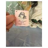Three Porcelain Dolls - One with Swing