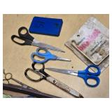 Assorted Hand Tools and Hardware including Scissors, Carabiners, and Decorative Rings