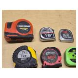 Lot of Tape Measures including Black & Decker AutoTape, Tool Shop 25ft, and Project Pro 25ft