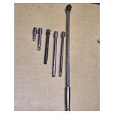 Breaker bar and socket extensions set including various lengths and sizes