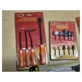 Tool Cache Pistol Grip Junior Hacksaw, Scraper Set, Mounted Stone Set, Caliper Gauge, and X-ACTO Knife