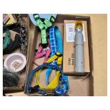 Pet supplies and aquarium items including dog harnesses, aquarium filter, and accessories