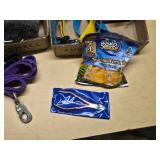 Pet supplies and aquarium items including dog harnesses, aquarium filter, and accessories