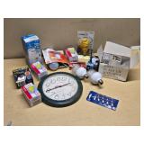 Various Light Bulbs and Wall Clock including Westinghouse Daylight Twist, EverBrite LED, and Sunbeam Anti-Insect Bulbs