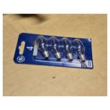 Various Light Bulbs and Wall Clock including Westinghouse Daylight Twist, EverBrite LED, and Sunbeam Anti-Insect Bulbs