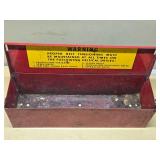 Red Metal Tractor Tool Box with Warning Label