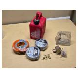Red Plastic Gas Can, Rolls of Utility Duct Tape, and Small Tools Assortment