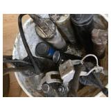 Lot of Grease Guns in a Bucke