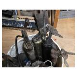 Lot of Grease Guns in a Bucke