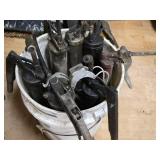 Lot of Grease Guns in a Bucke